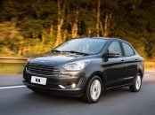 ford ka sedan cinza de frente em movimento