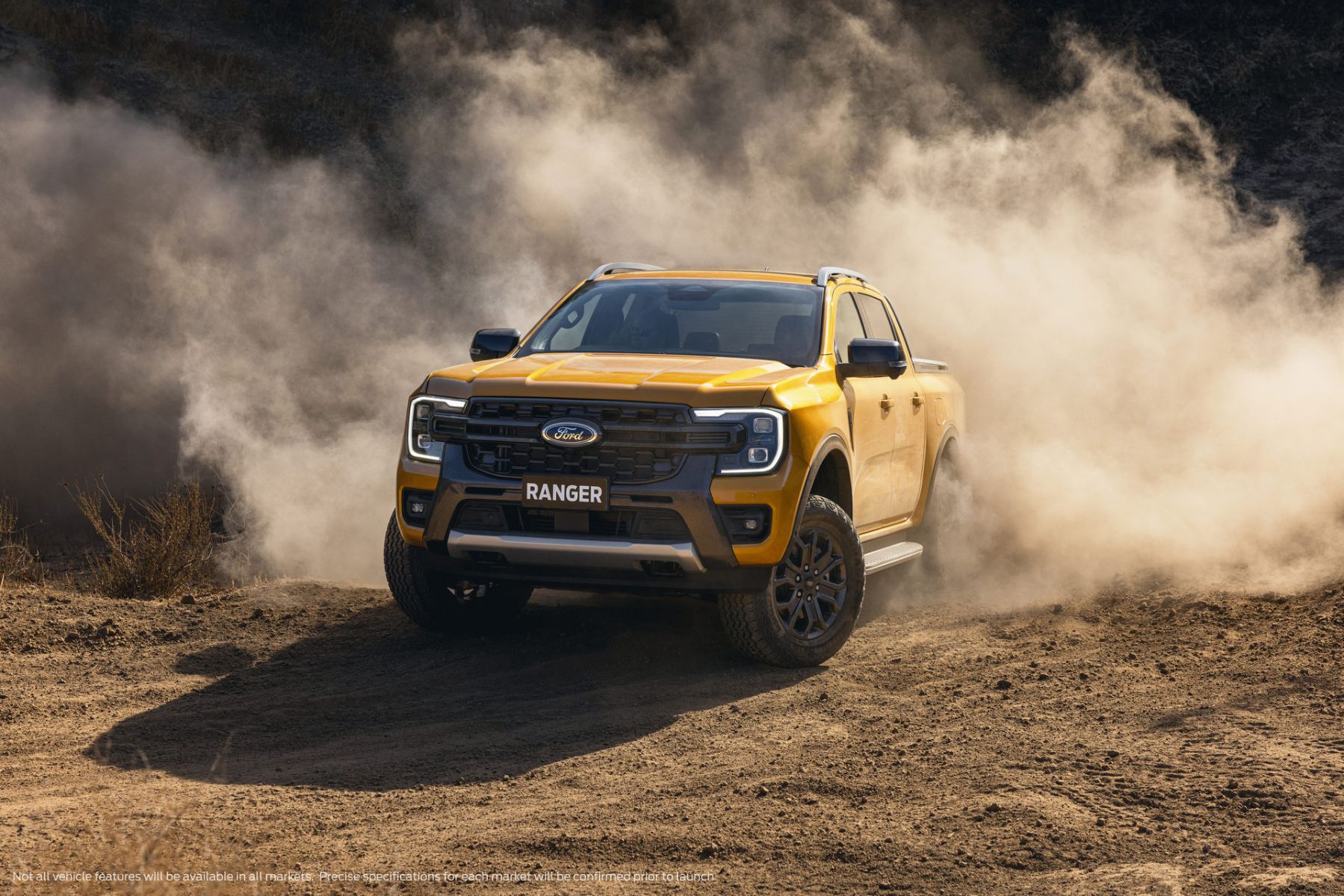 ford ranger wildtrak 2022 australia amarela frente terra em movimento