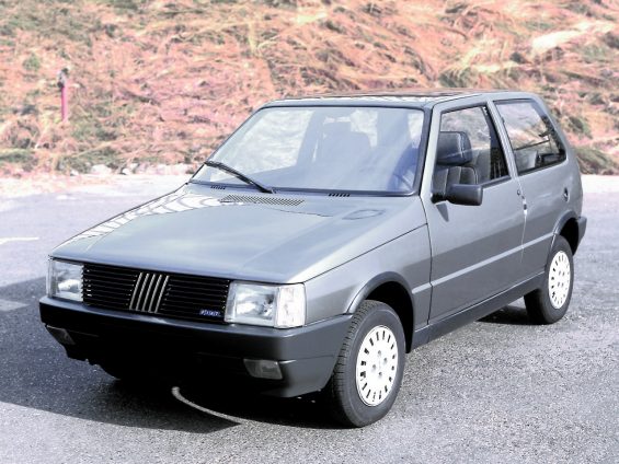 fiat uno sx br spec cinza frente parado