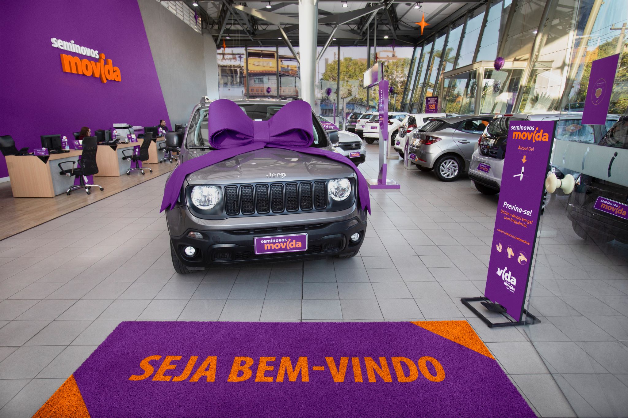 jeep renegade cinza com laco roxo em loja movida seminovos