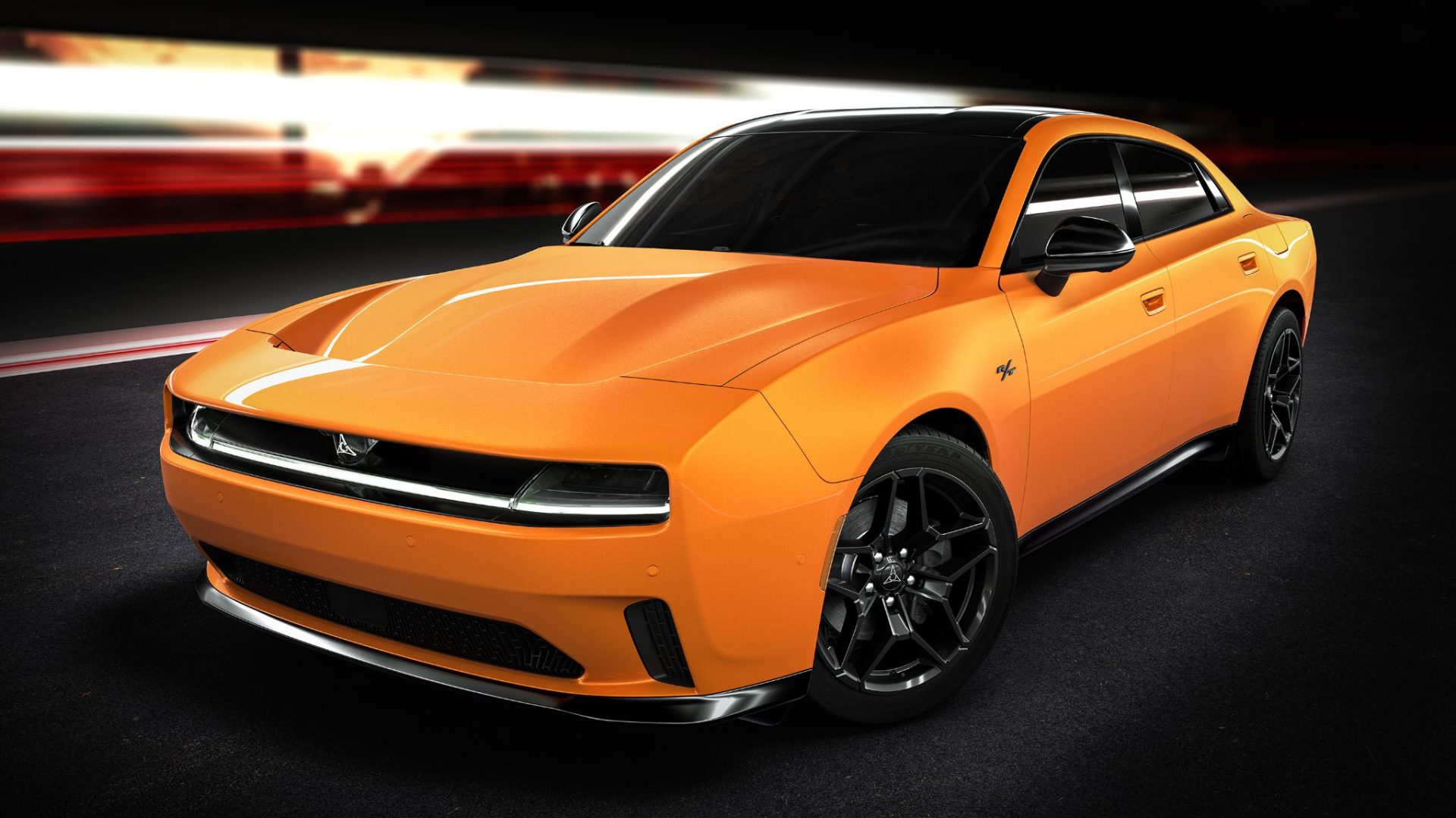 dodge charger r t 4 portas laranja frente parado