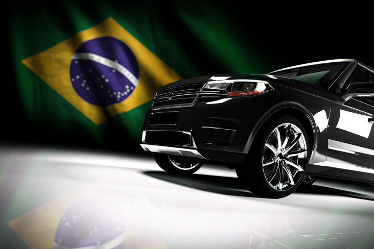 carro bandeira do brasil ao fundo 1200x800 1