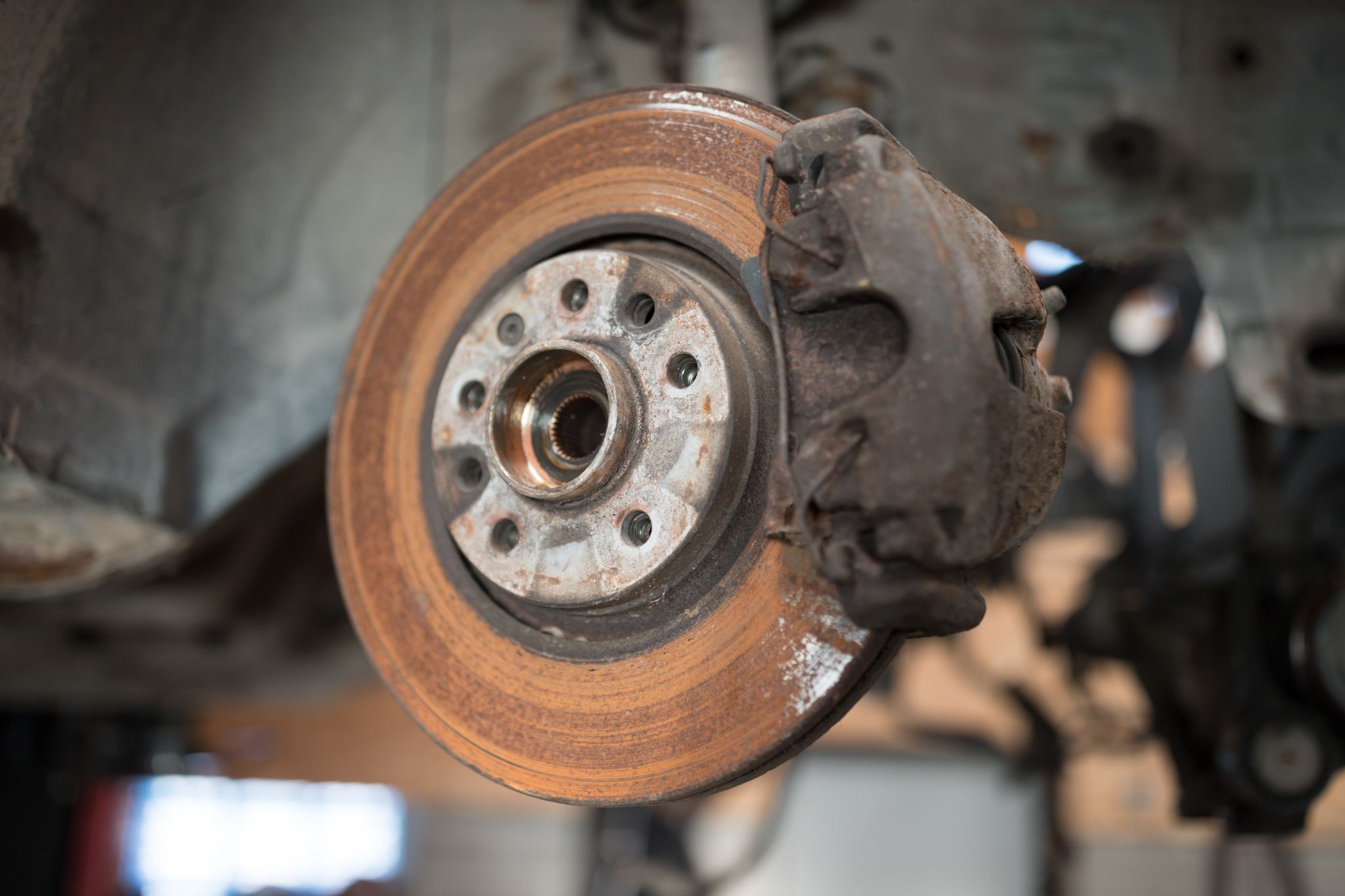 Old,And,Rusty,Car's,Suspension,Parts ,Rusted,Disc,Brake,And