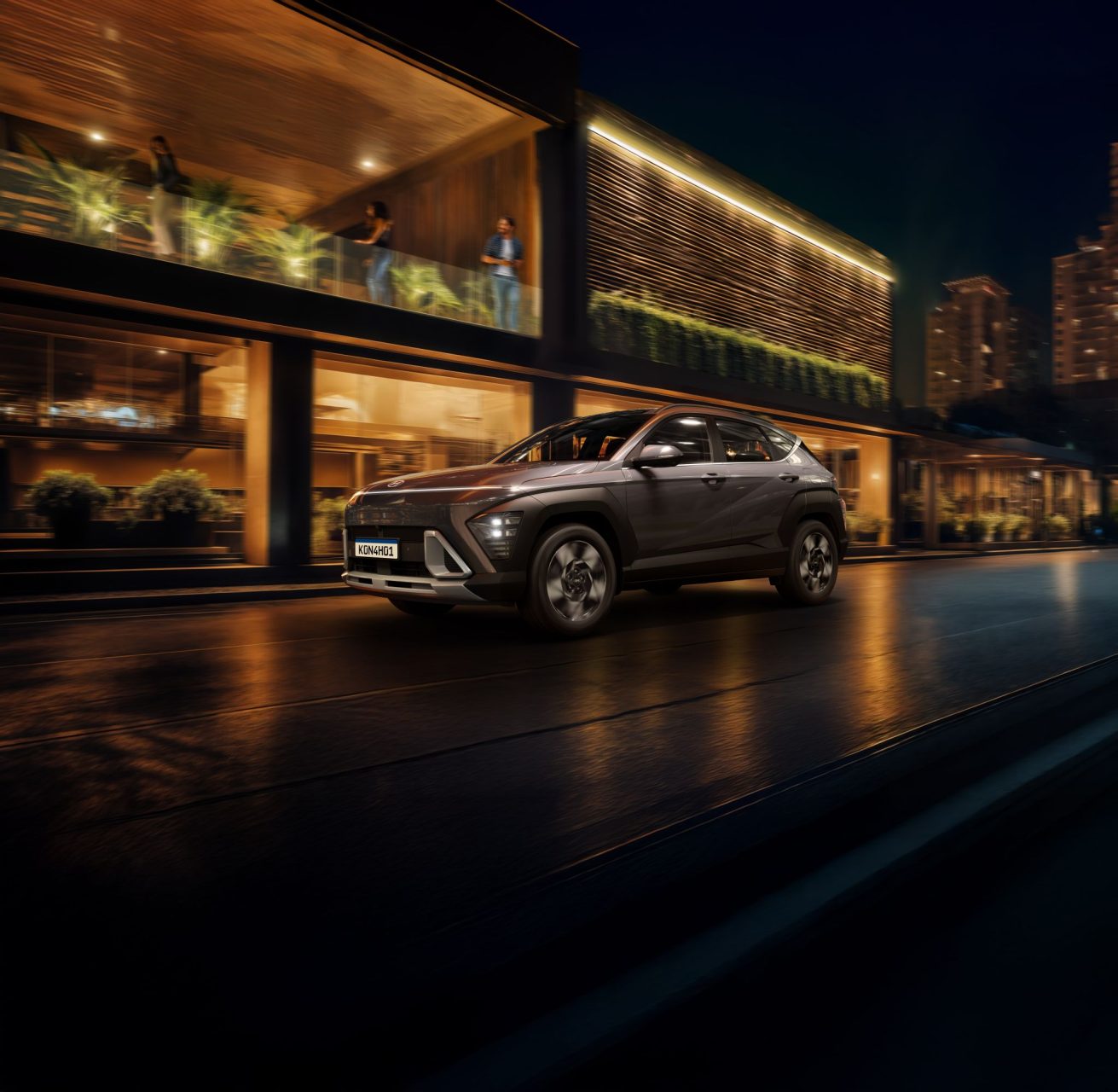 Hyundai Kona Hybrid 2026 cinza pérola frente parado a noite