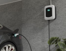 recarga de carro eletrico em predio foto shutterstock