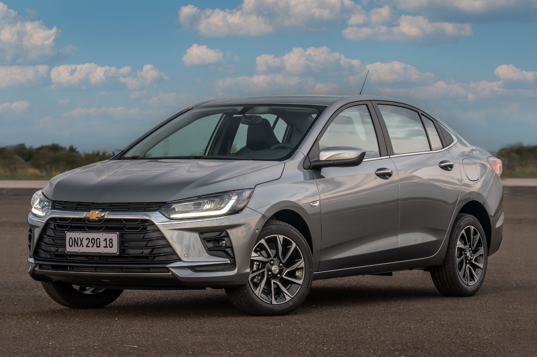 chevrolet 2026 onix plus cinza drake frente parado