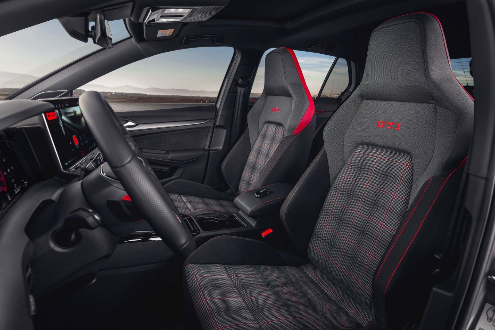 Volkswagen Golf GTI 2025 interior bancos dianteiros