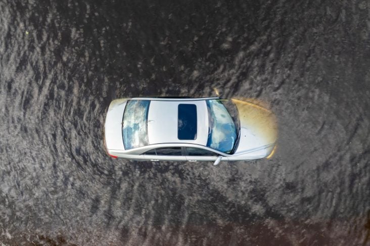Hurricane,Flooded,Car,On,City,Street,In,Surrounded,With,Water