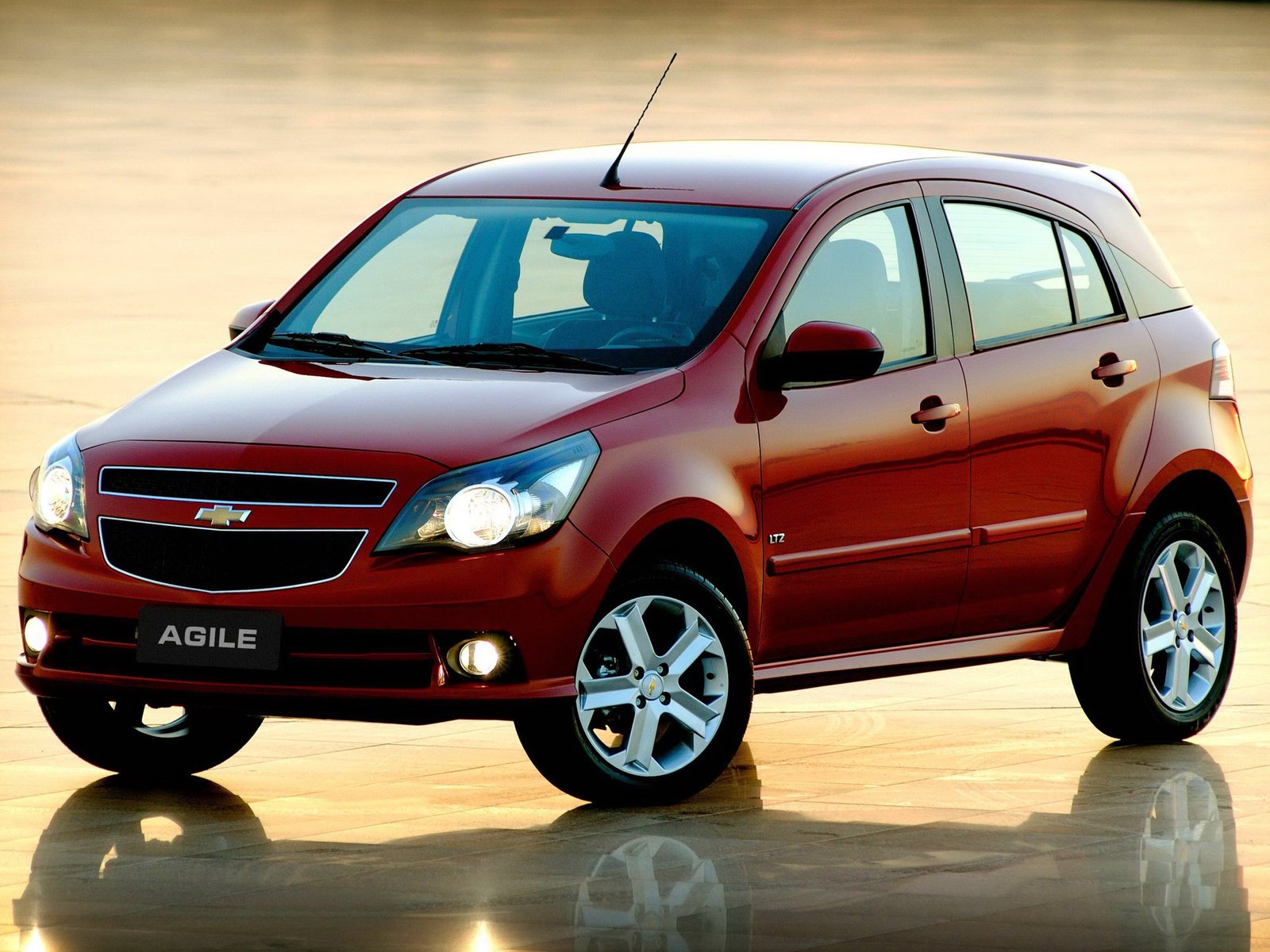 chevrolet agile LTZ 2010 vermelho frente parado