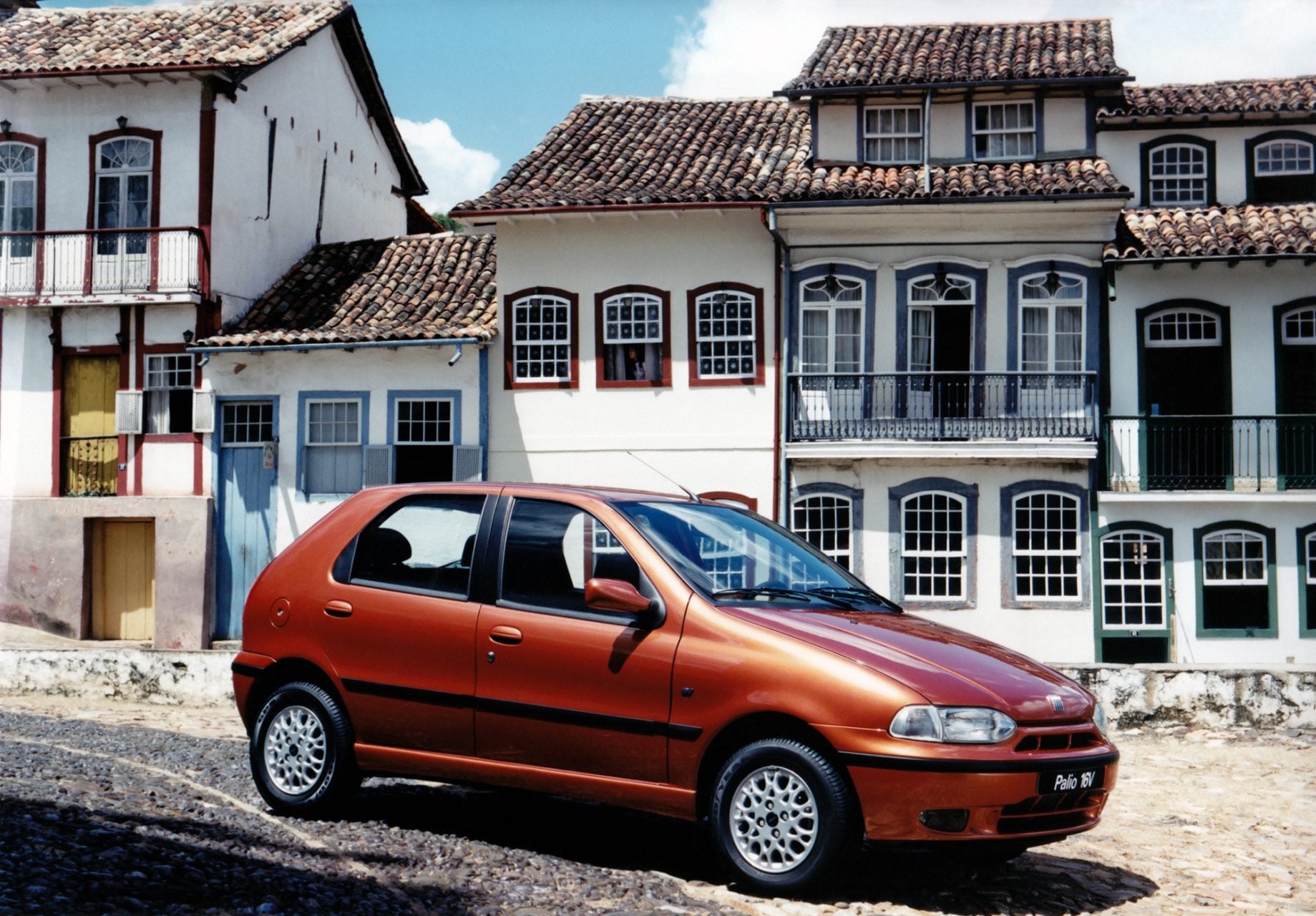 fiat palio 16v 1996 laranja frente parado