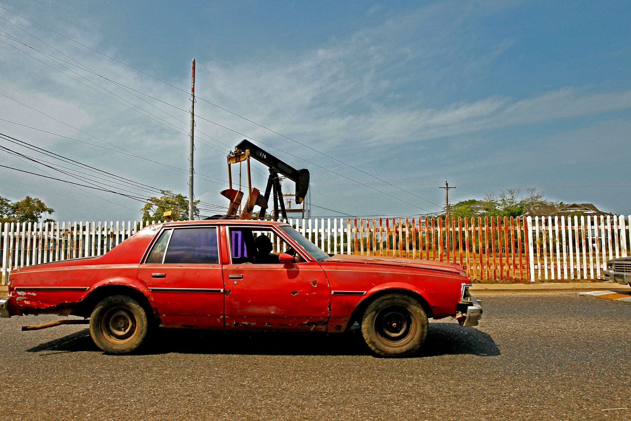 Lake,Maracaibo,,Venezuela ,18 03 2015 ,An,Old,Colective,Car,Pass,In Lake,Maracaibo,,Venezuela ,18 03 2015 ,An,Old,Colective,Car,Pass,In