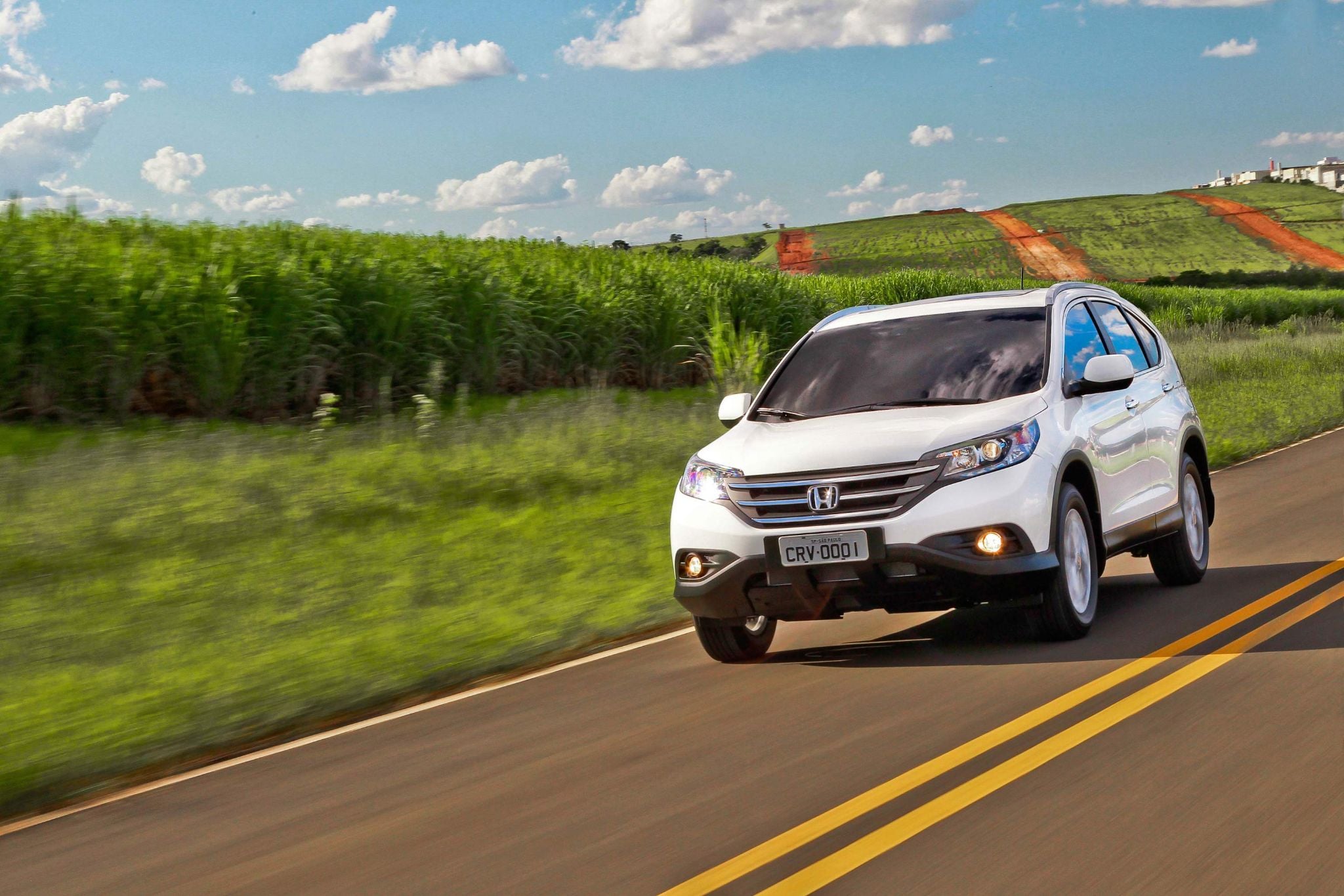 honda cr v EXL 4WD 2013 branco frente em movimento
