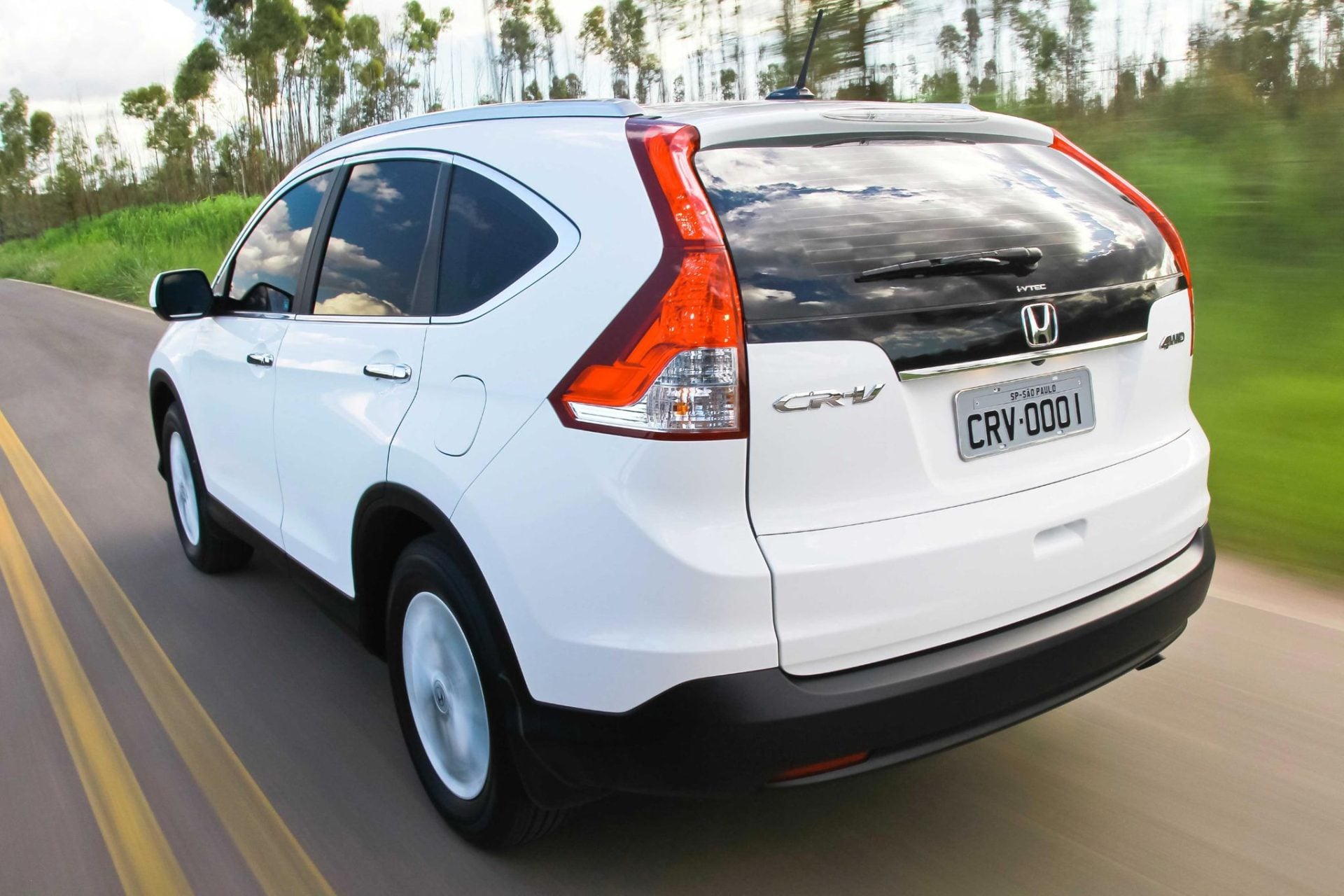 Honda CR V EXL 4WD 2012 branco traseira em movimento