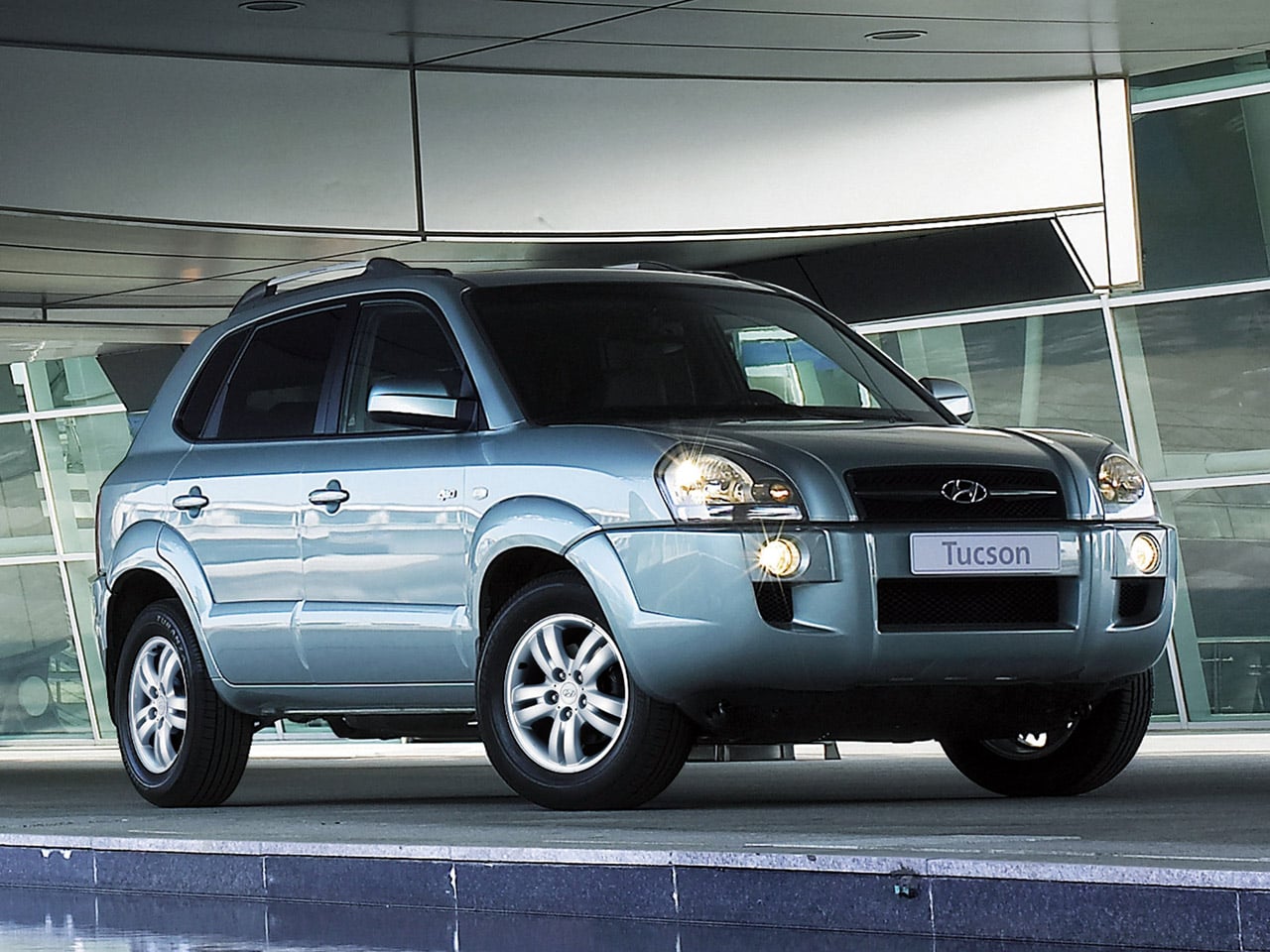 hyundai tucson 2007 prata frente parado