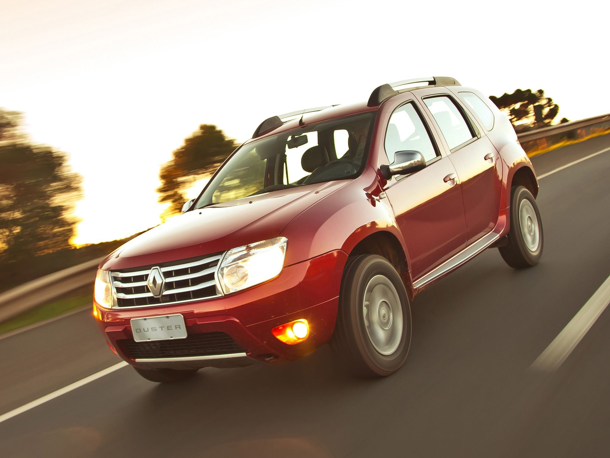 renault duster 2012 vermelho frente em movimento renault duster 2012 vermelho frente em movimento
