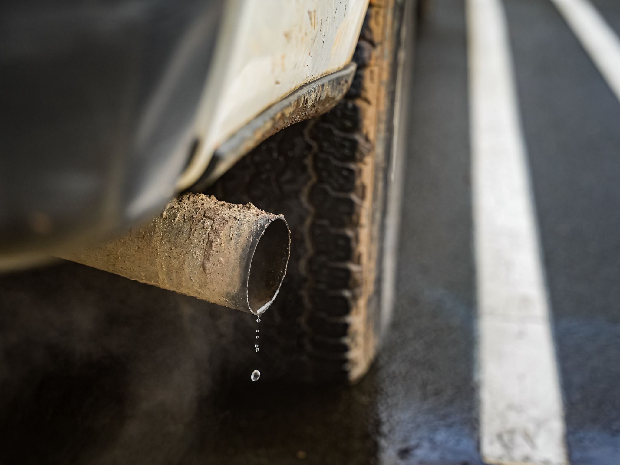 Close,Up,Of,A,Truck,Tailpipe,Exhaust,With,Smoke,And