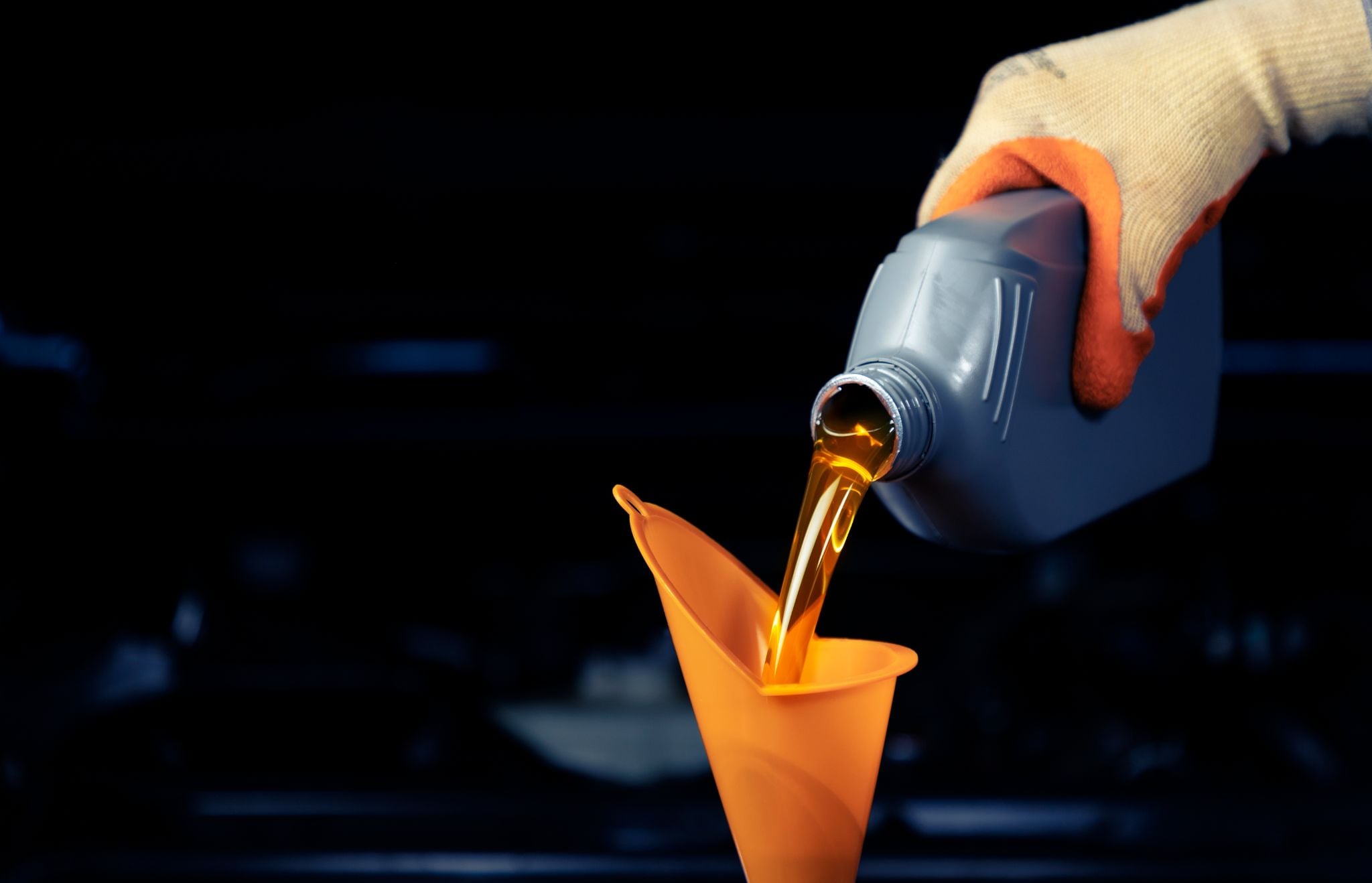 Car,Mechanic,,Oil,Change,Or,Fuel,From,A,Bottle,Of