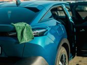 Microfiber,Cloth,On,Blue,Car,Hood,And,Headlight,After,Washing,