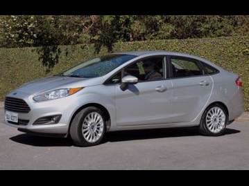 ford new-fiesta-sedan-16-titanium-powershift-aut-2015 lateral